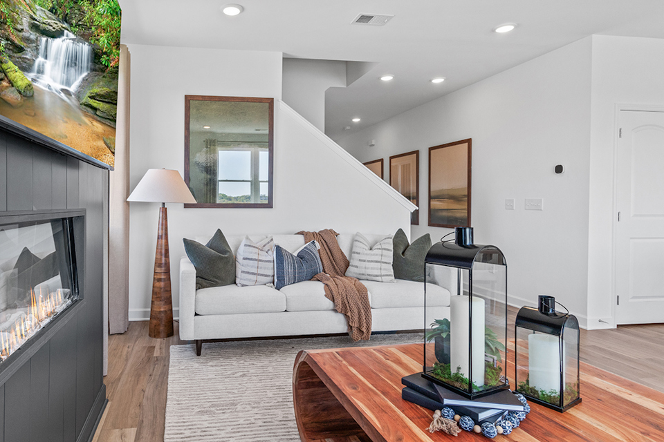 A living room with a fireplace.
