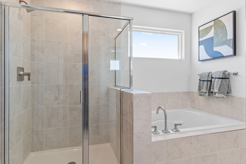 A bathroom with a glass shower.
