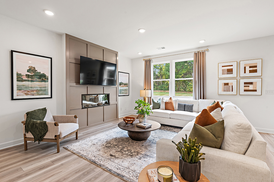 A living room with a tv and couches.