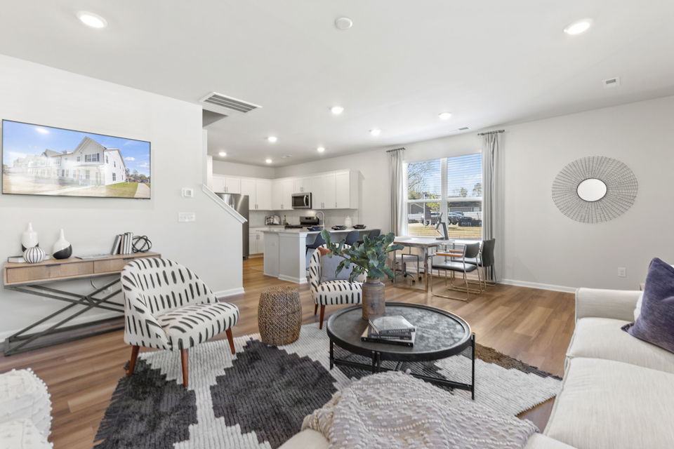 A living room with a large window.