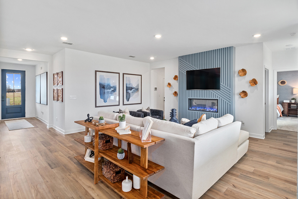 A living room with a large white couch.
