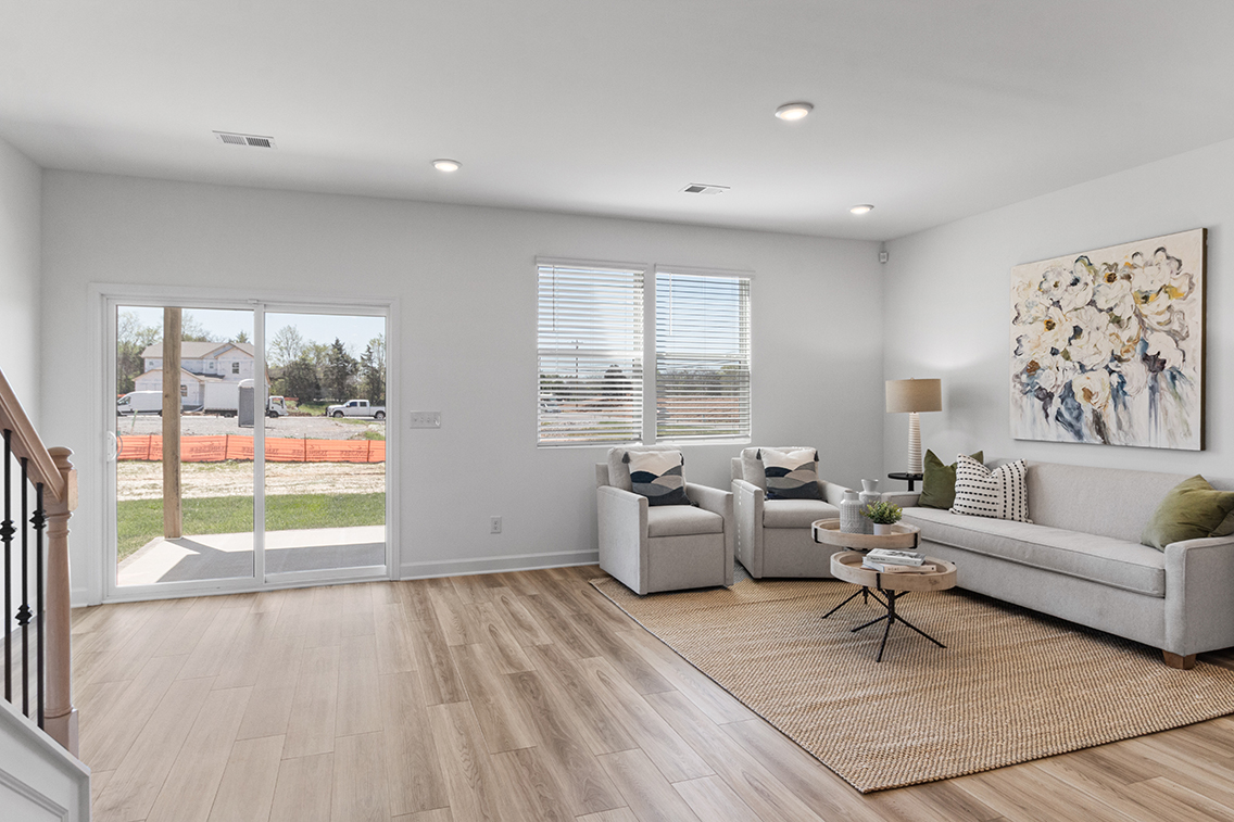 A living room with a large window.