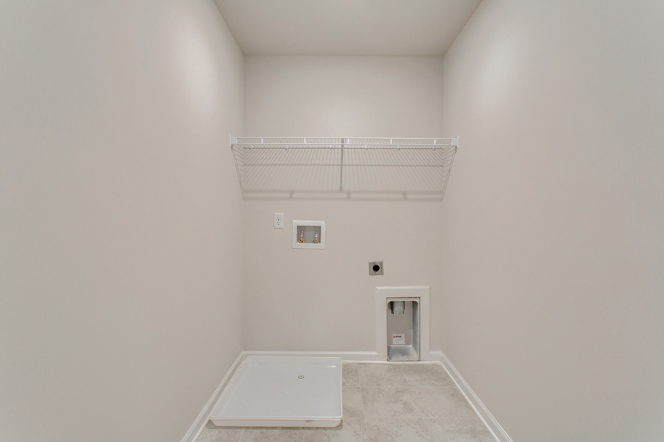 A white room with a white wall.