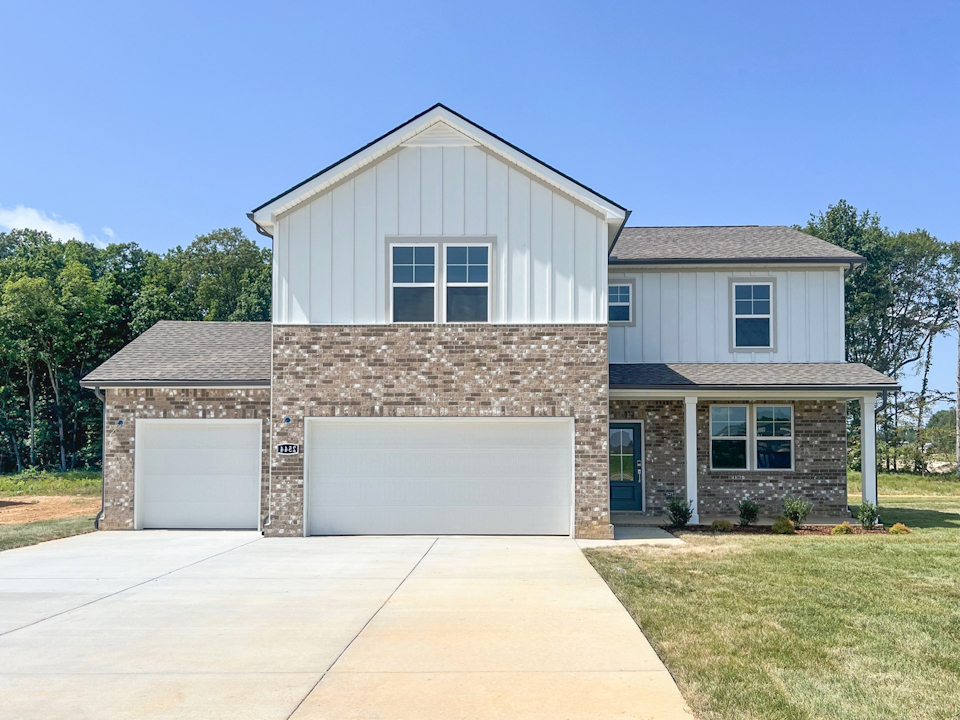 A house with a stone wall.