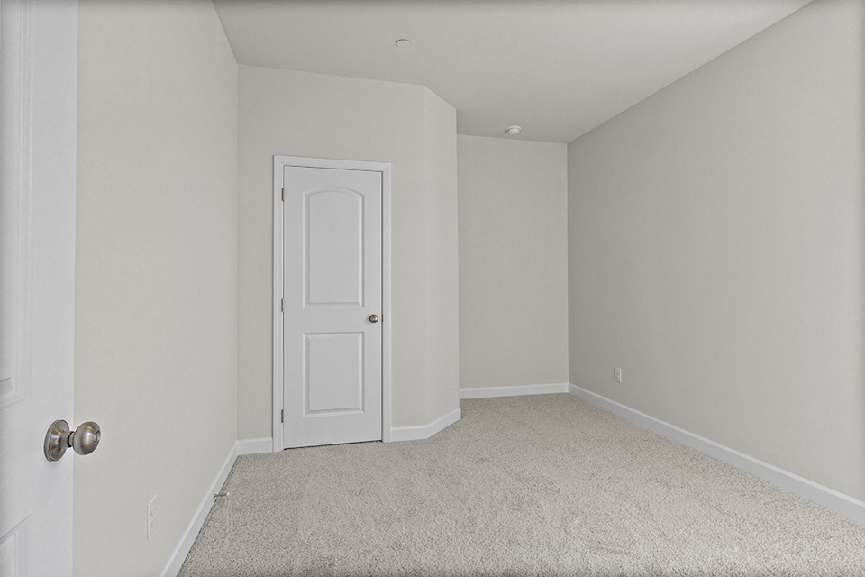 A room with white doors.