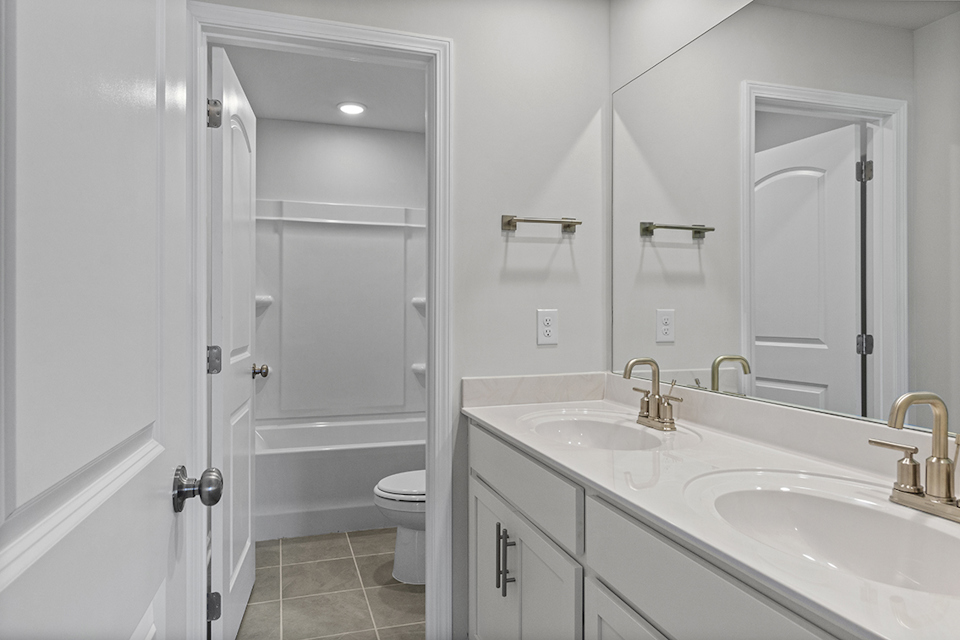 A bathroom with a glass shower.