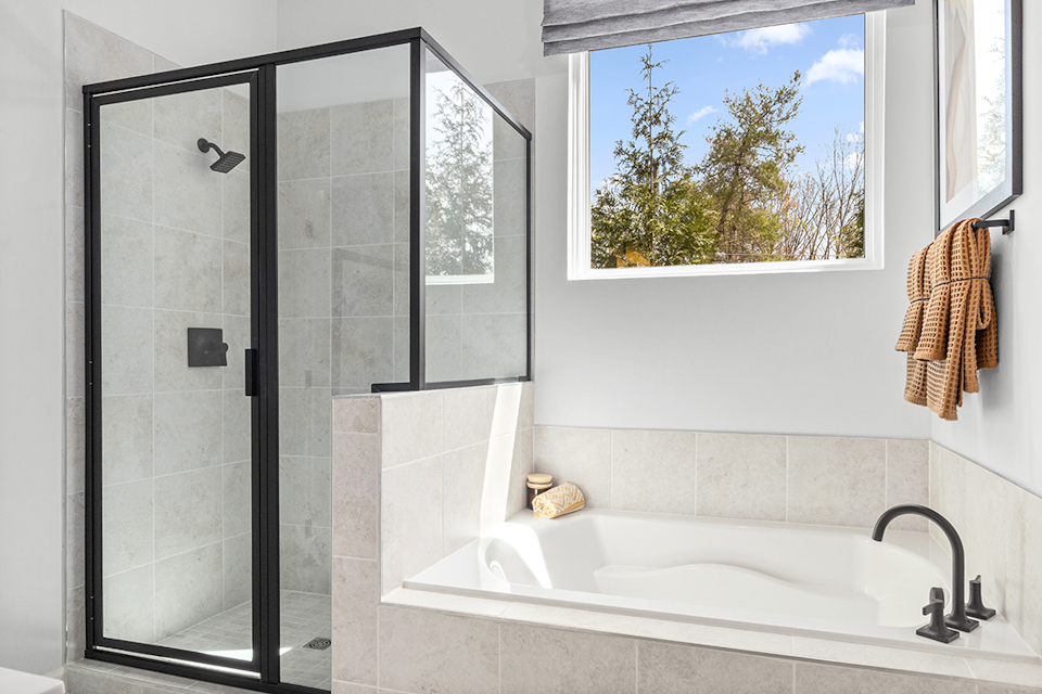 A bathroom with a glass shower.