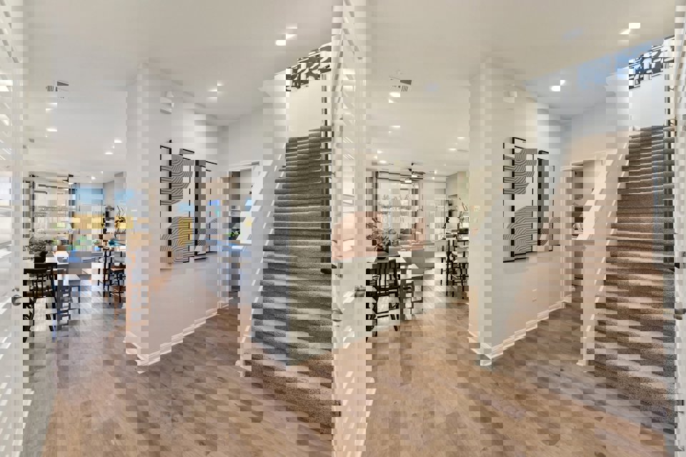 A large room with wood floors.