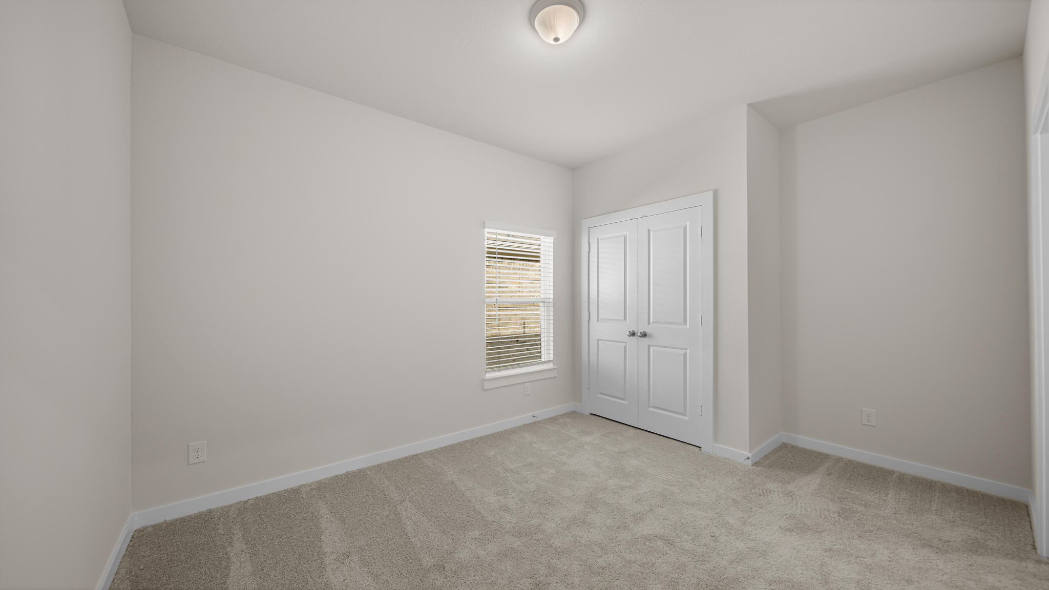 A room with white doors.