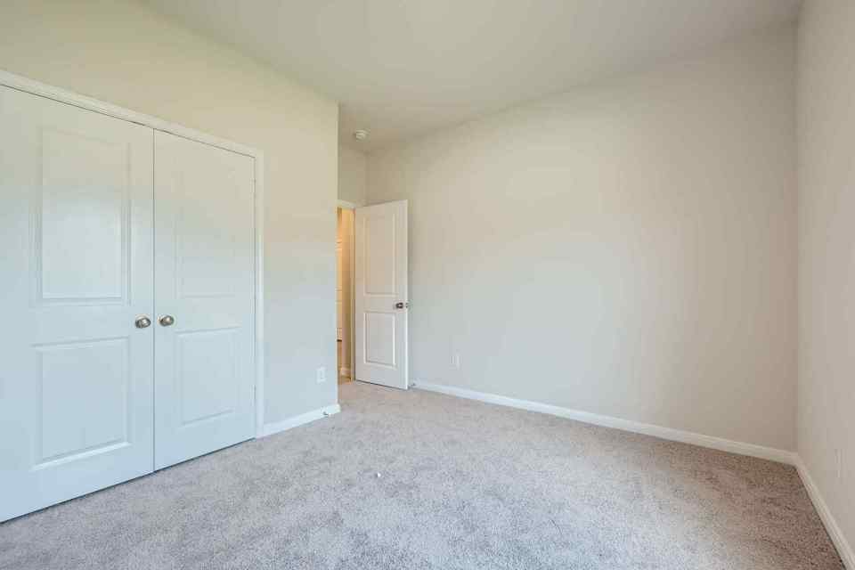 A room with white doors.