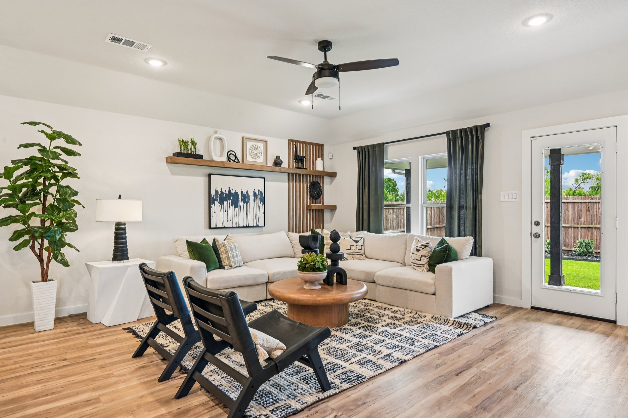 A living room with a fan.