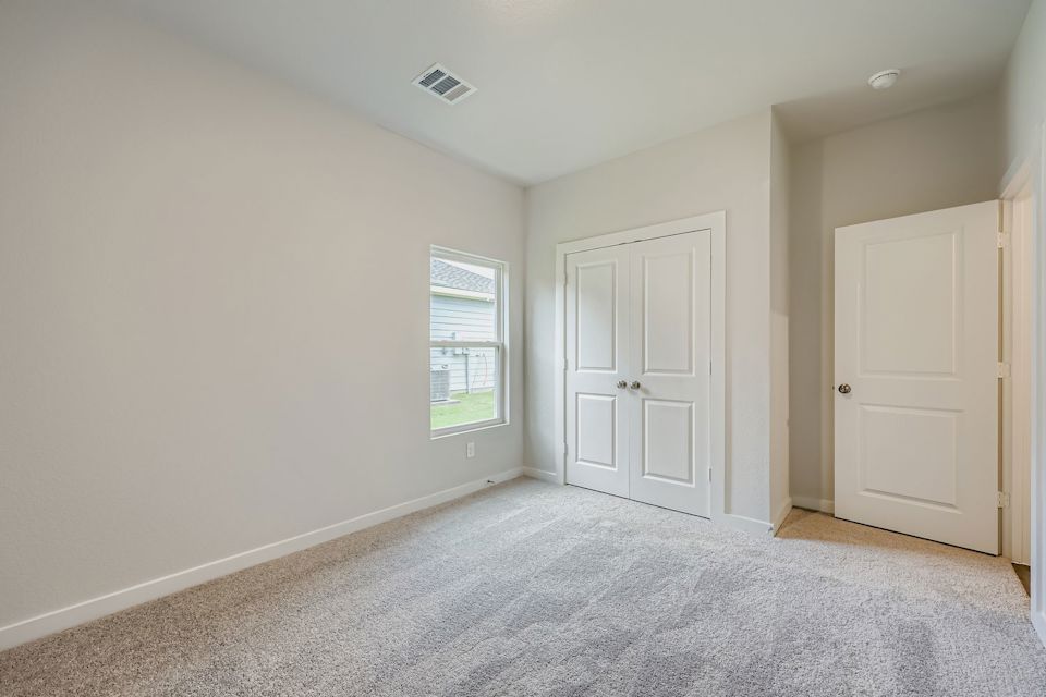 A room with white doors.