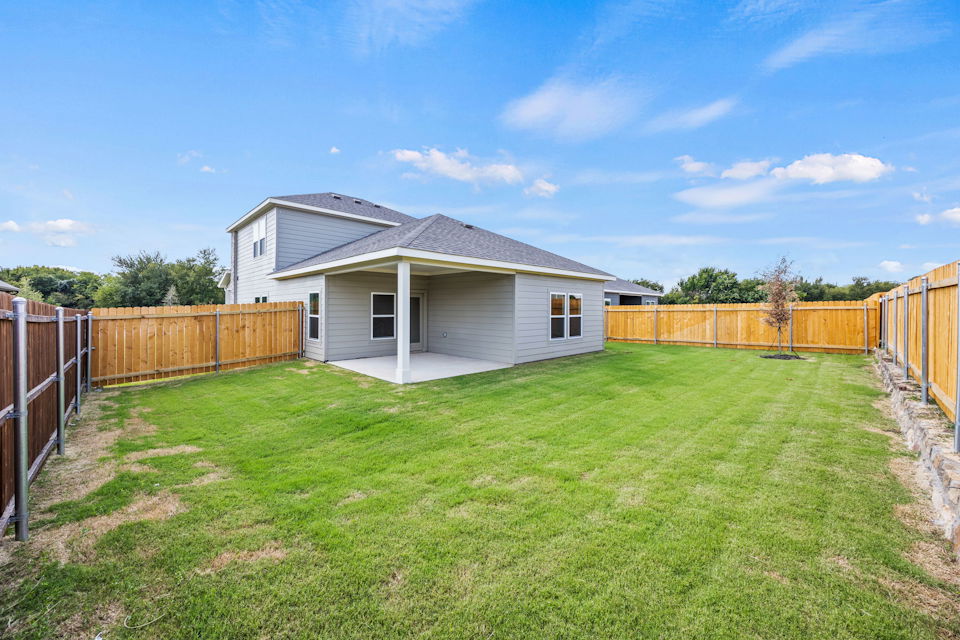 A house with a fence around it.