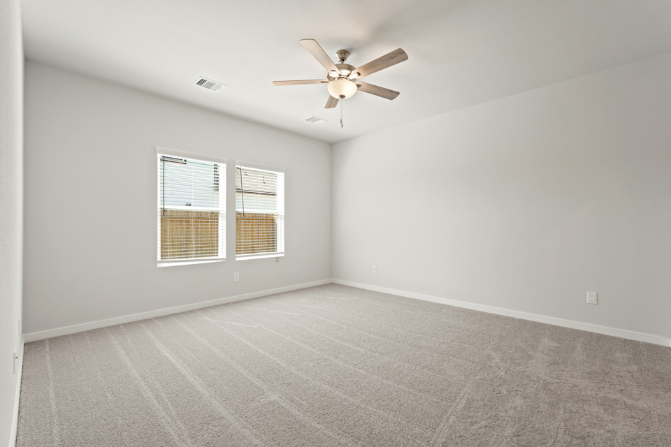 A ceiling fan in a room.