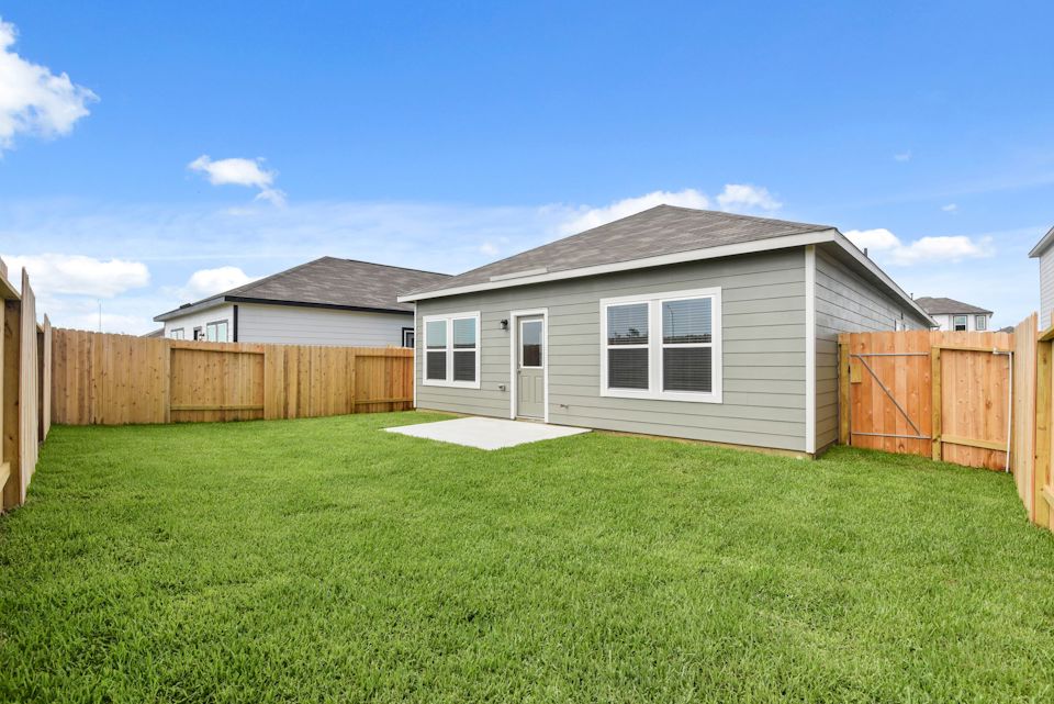 A house with a fence around it.