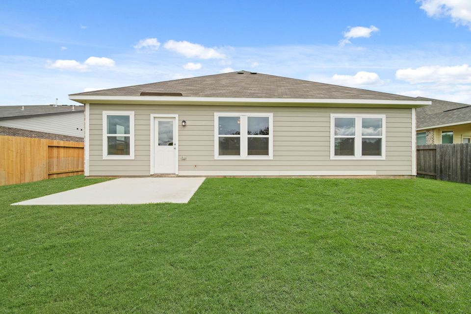 A house with a lawn.