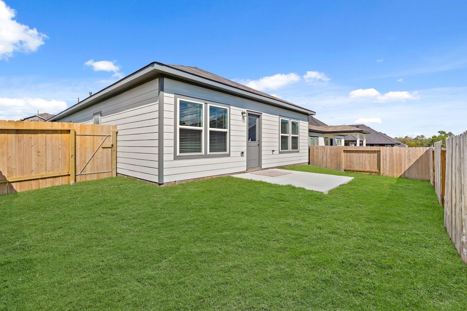 A house with a fence around it.