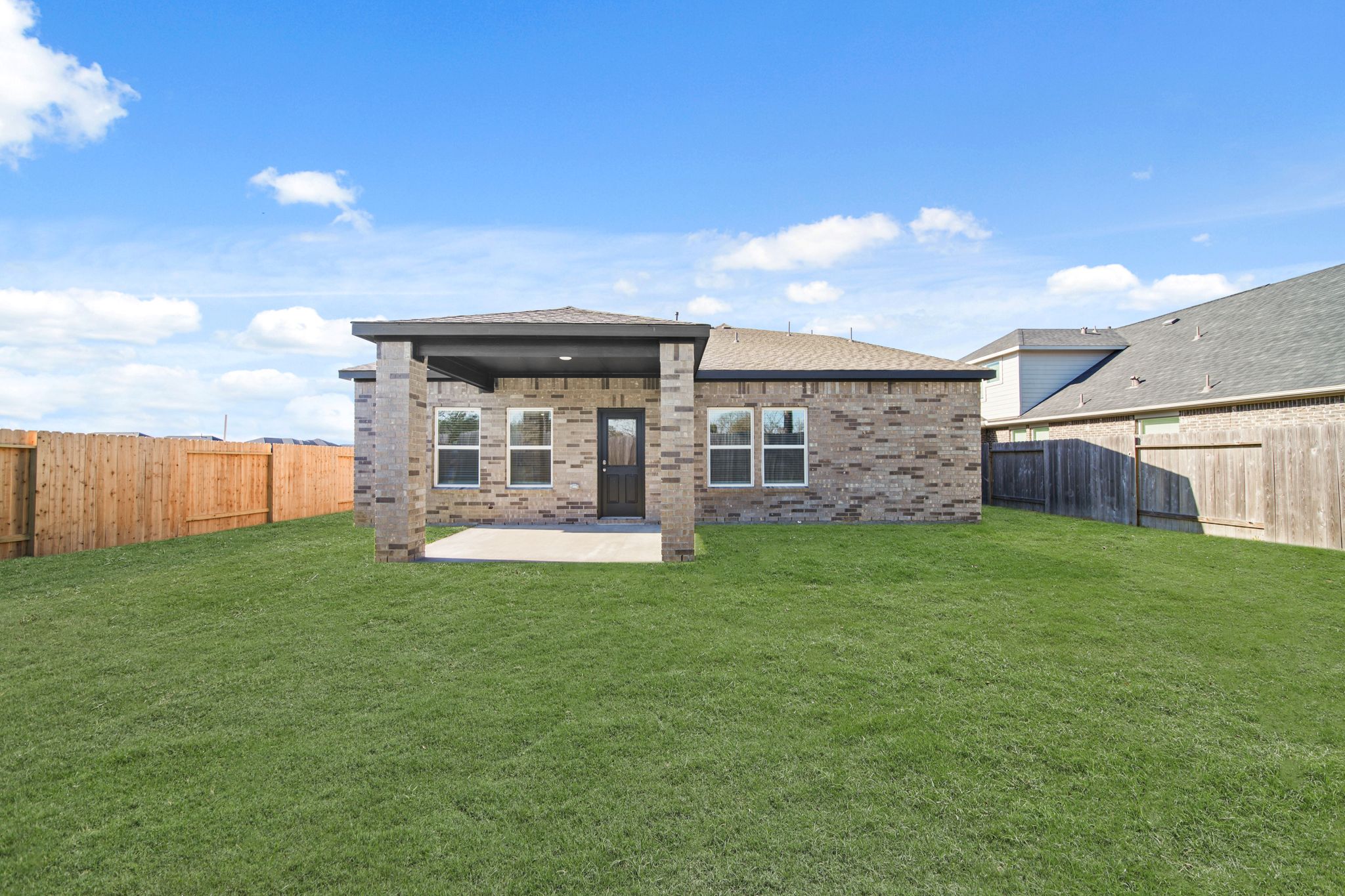 A house with a fence around it.