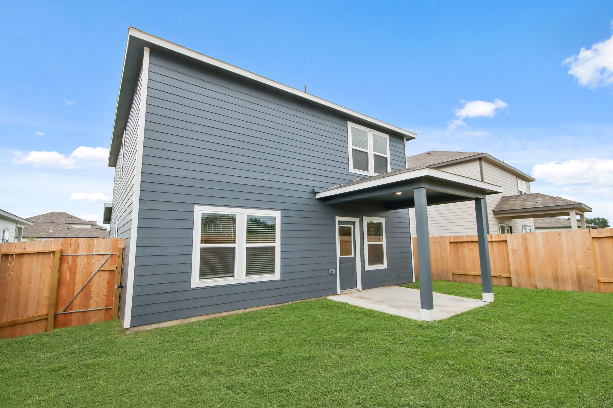 A house with a fence around it.