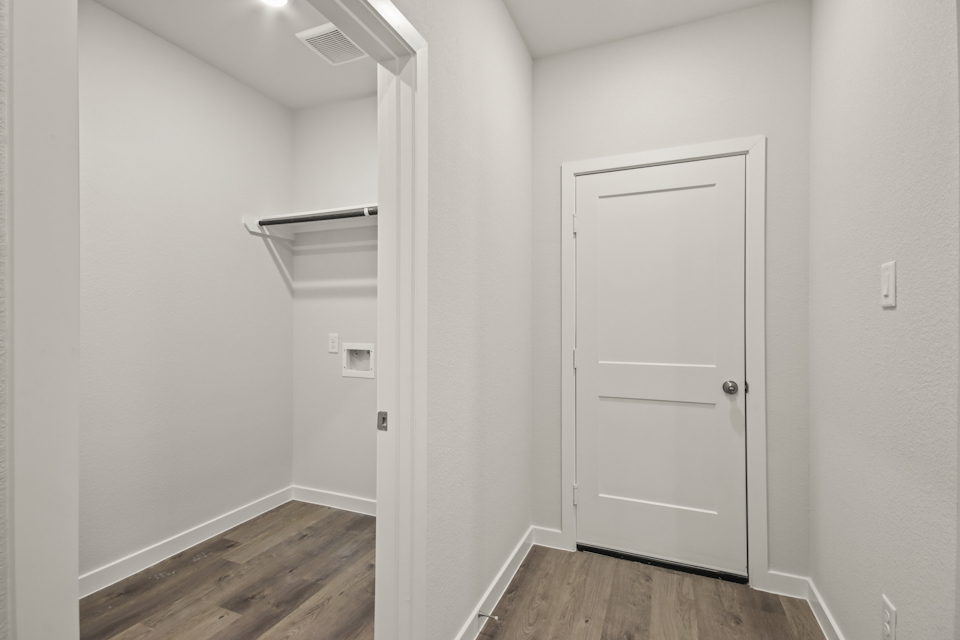 A white door in a room.
