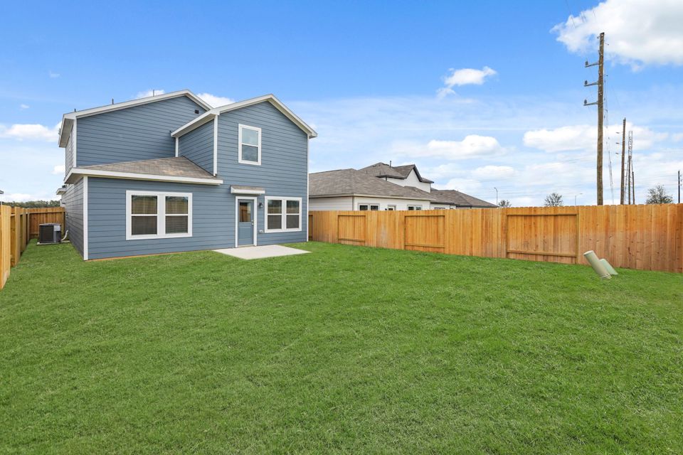 A house with a fence around it.