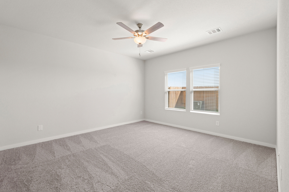 A ceiling fan in a room.