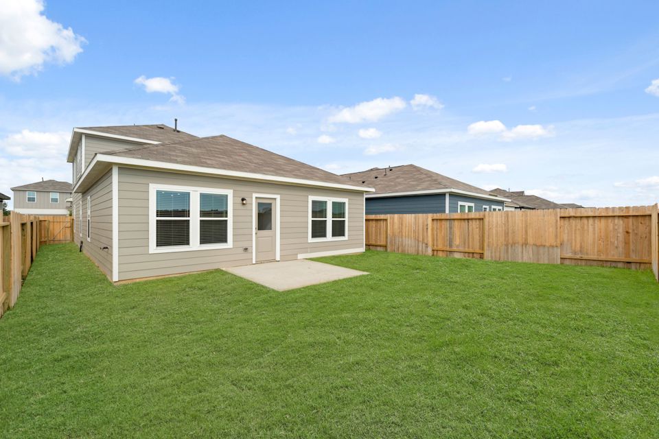A house with a fence around it.
