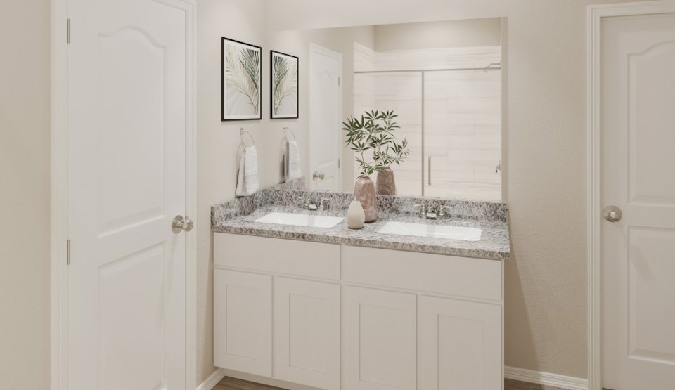 A bathroom with a marble countertop.