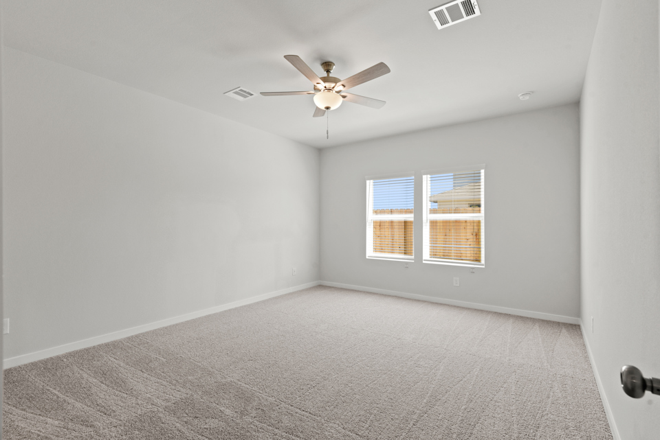 A ceiling fan in a room.