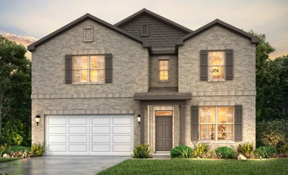 A house with a garage and a pond in front of it.
