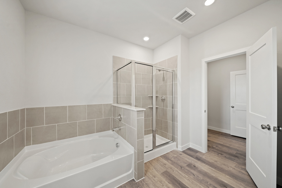 A bathroom with a glass shower.
