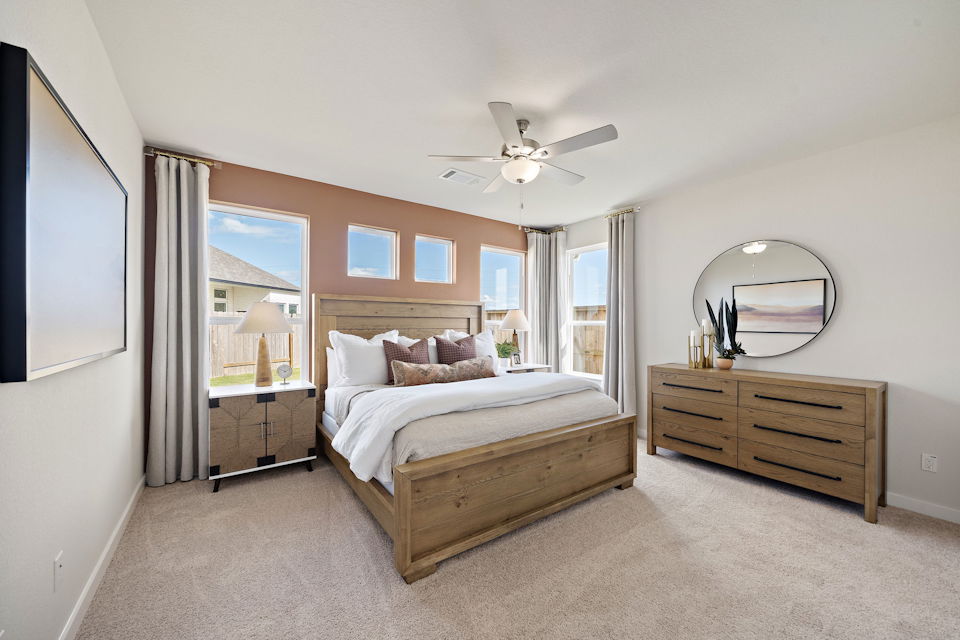 A bedroom with a large bed.