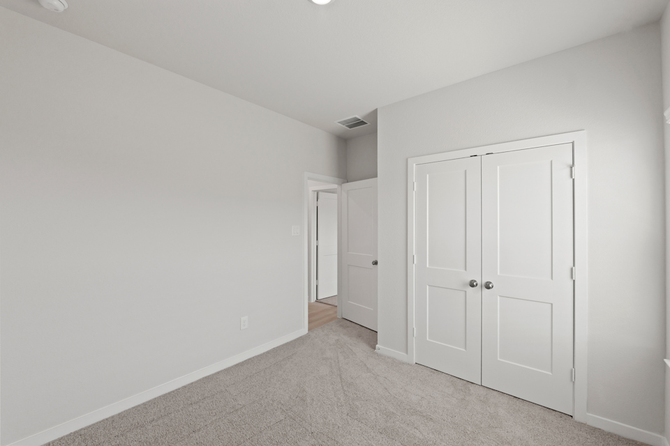 A room with white doors.