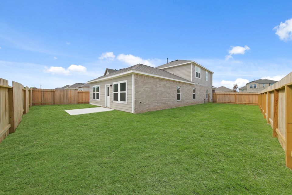 A house with a fence around it.