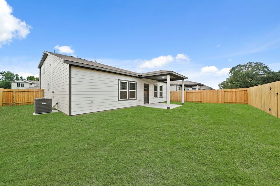 A house with a fence around it.