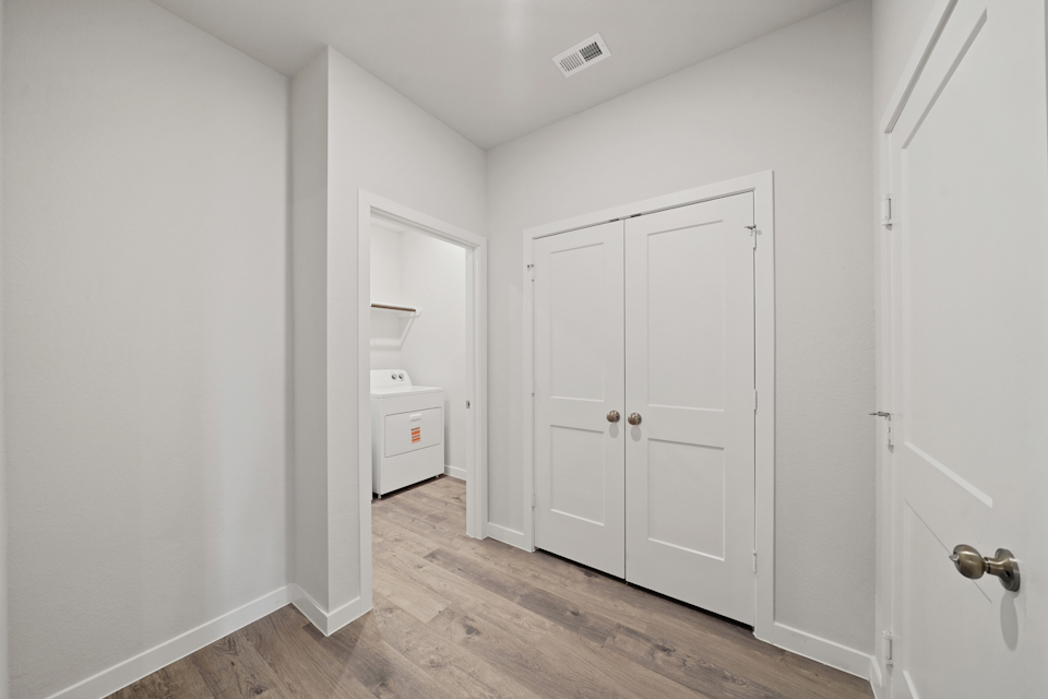 A room with white doors.