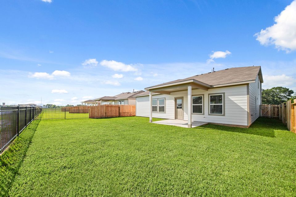 A house with a fence around it.