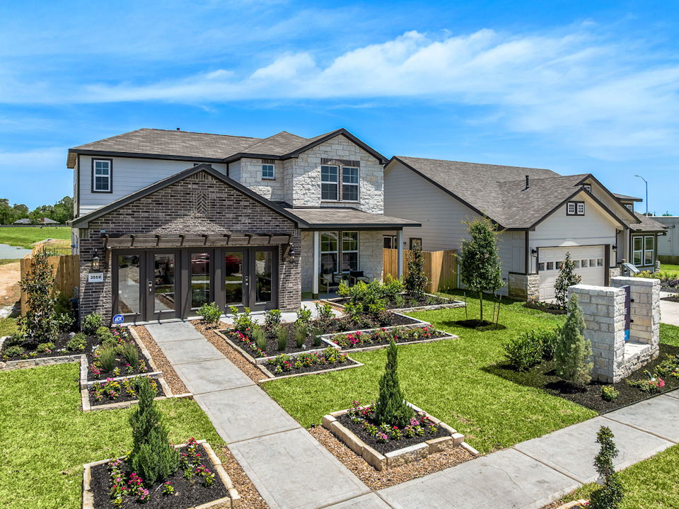 A house with a large front yard.