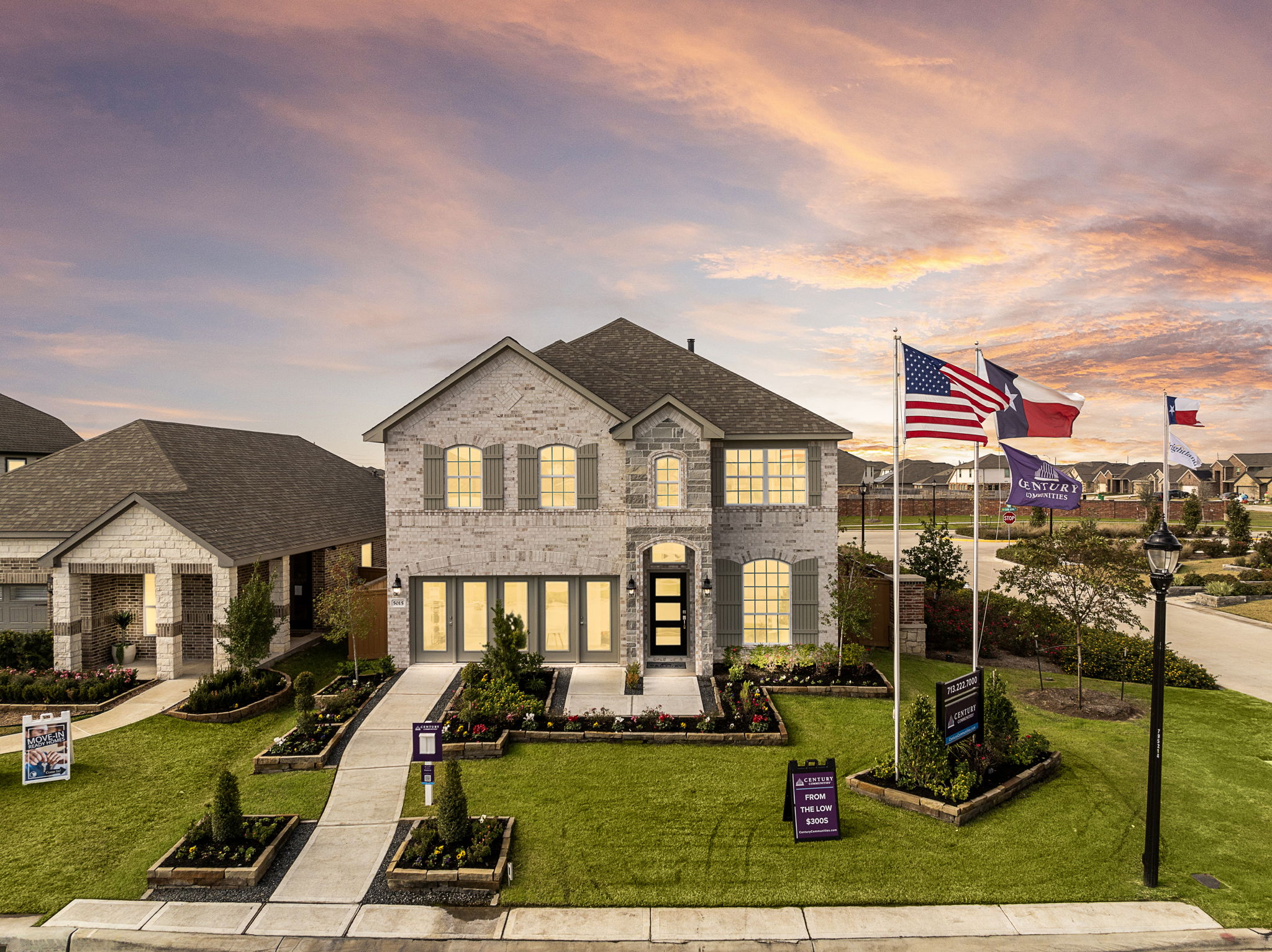 A house with flags in the front.