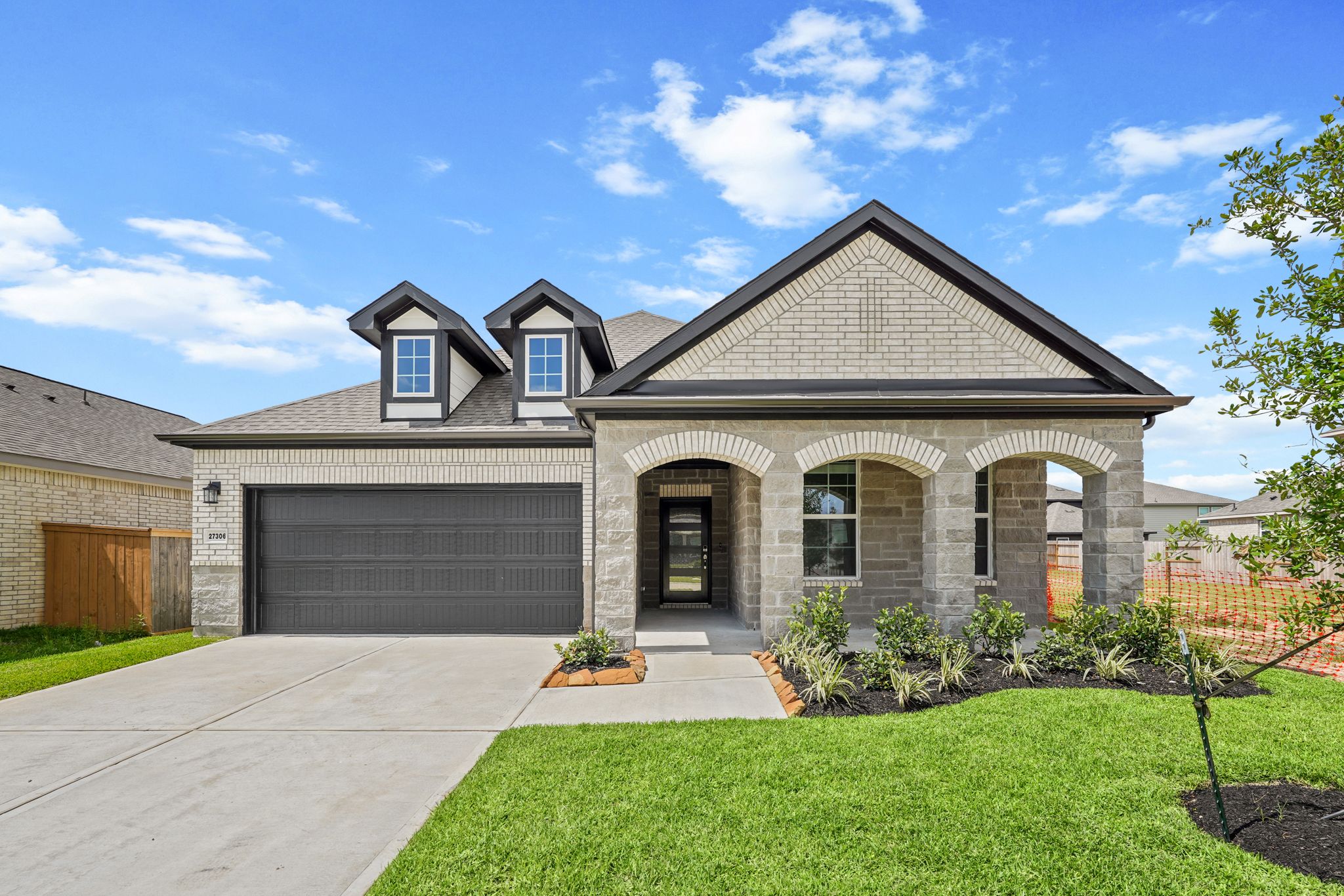 A house with a driveway.