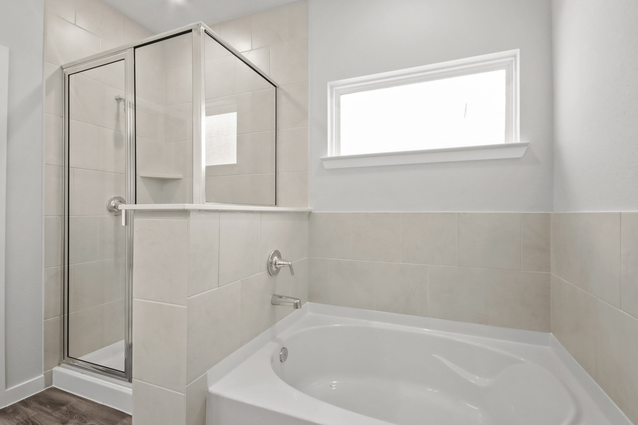 A bathroom with a glass shower.
