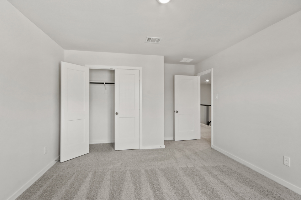 A room with white doors.