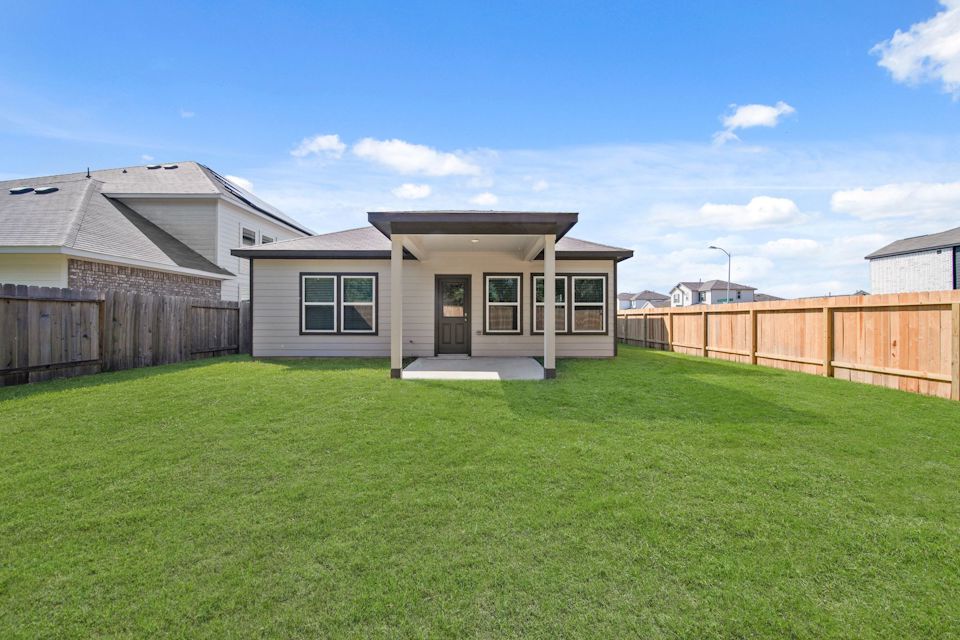 A house with a fence around it.