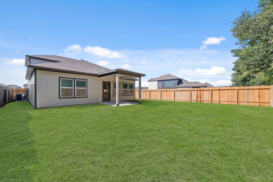 A house with a fence around it.