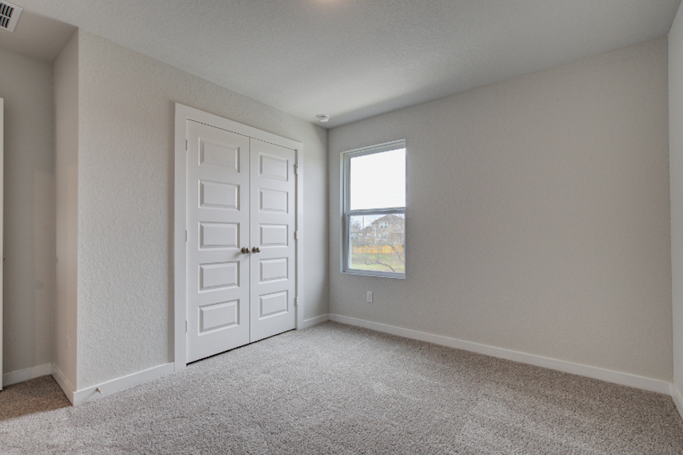 A room with white doors.