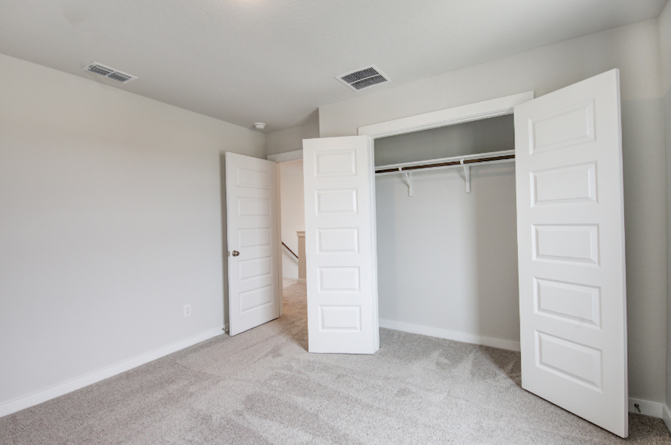 A room with white doors.