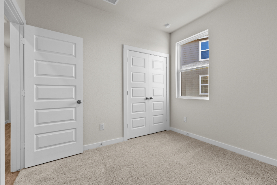 A room with white doors.