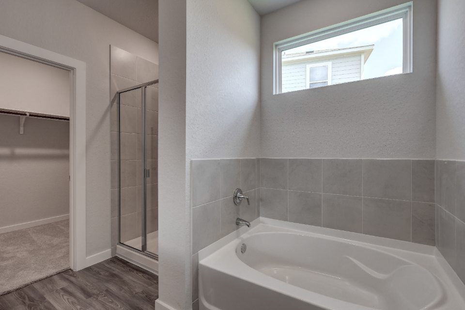 A bathroom with a glass shower.