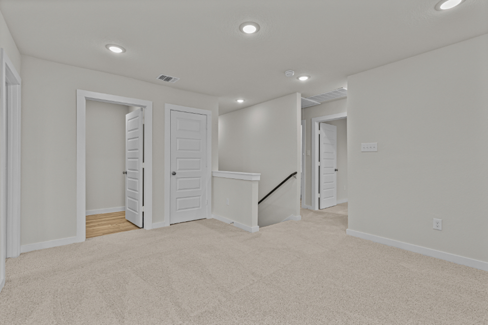 A room with white doors.