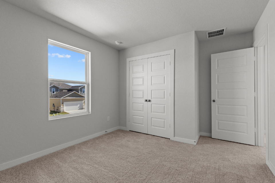 A room with white doors.